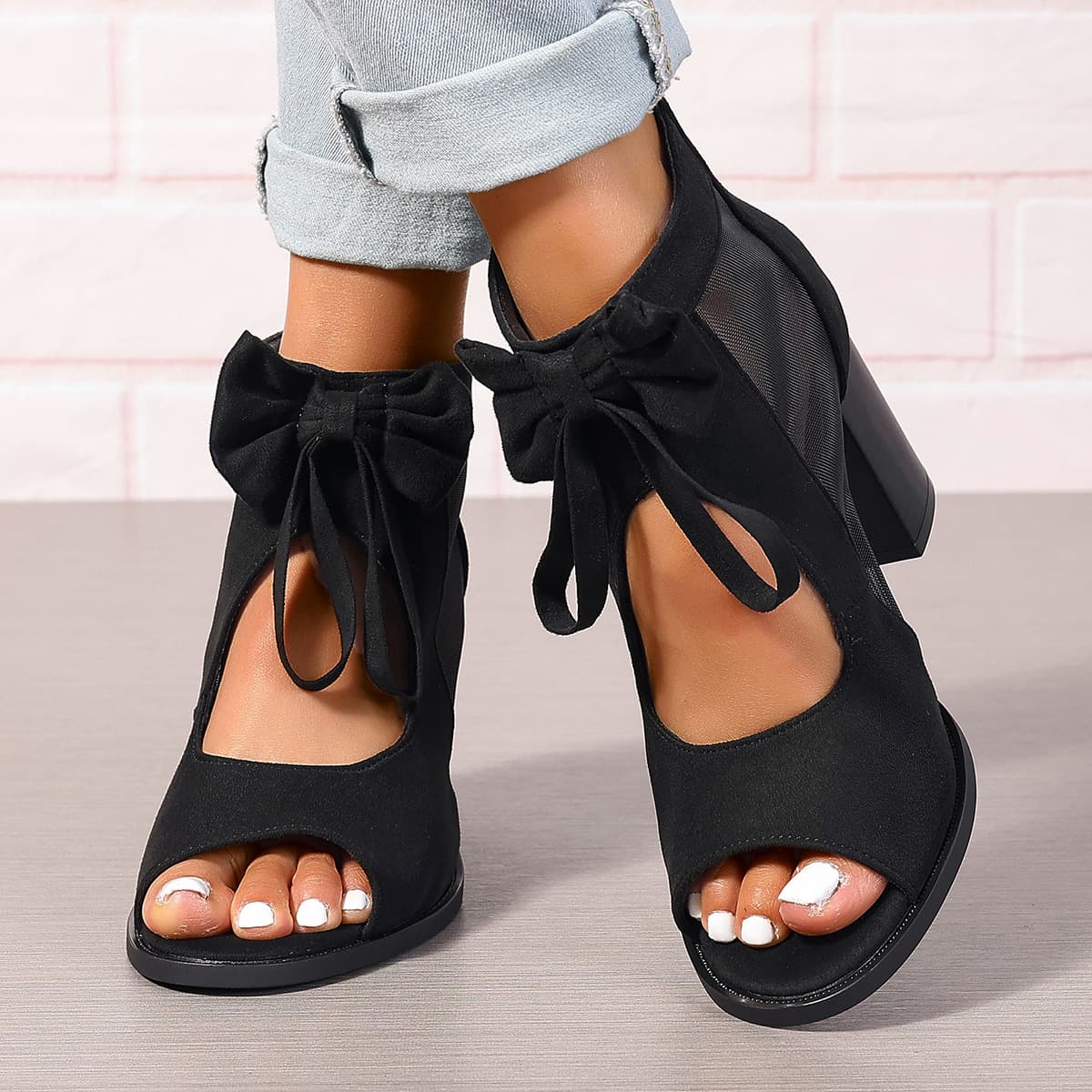 Sandalias plataforma con tacón grueso y moño