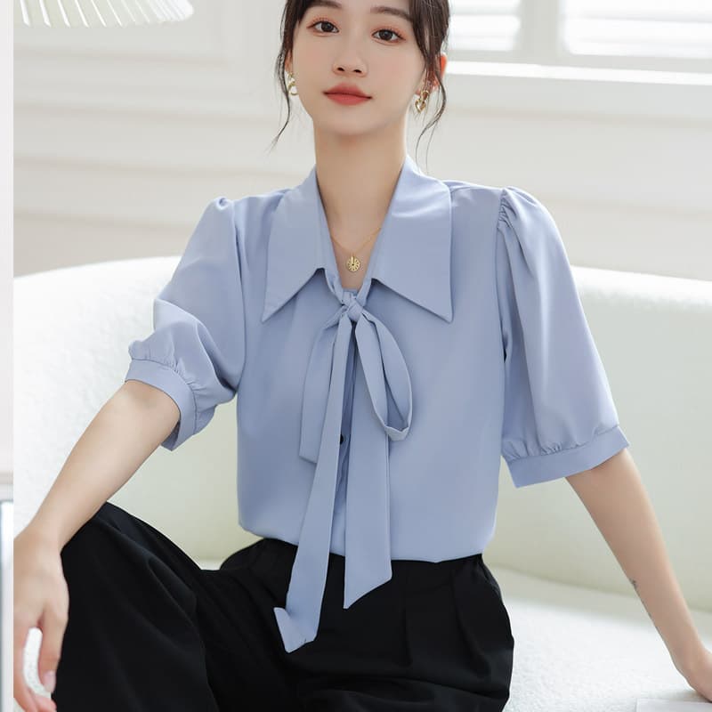 Blusa coreana de gasa con manga puff y moño