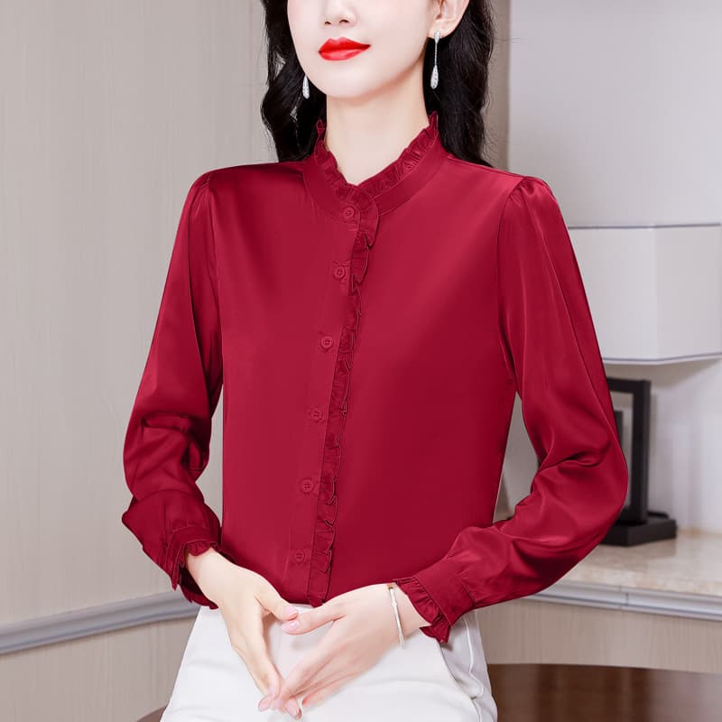 Blusa elegante de cuello de pie con mangas largas