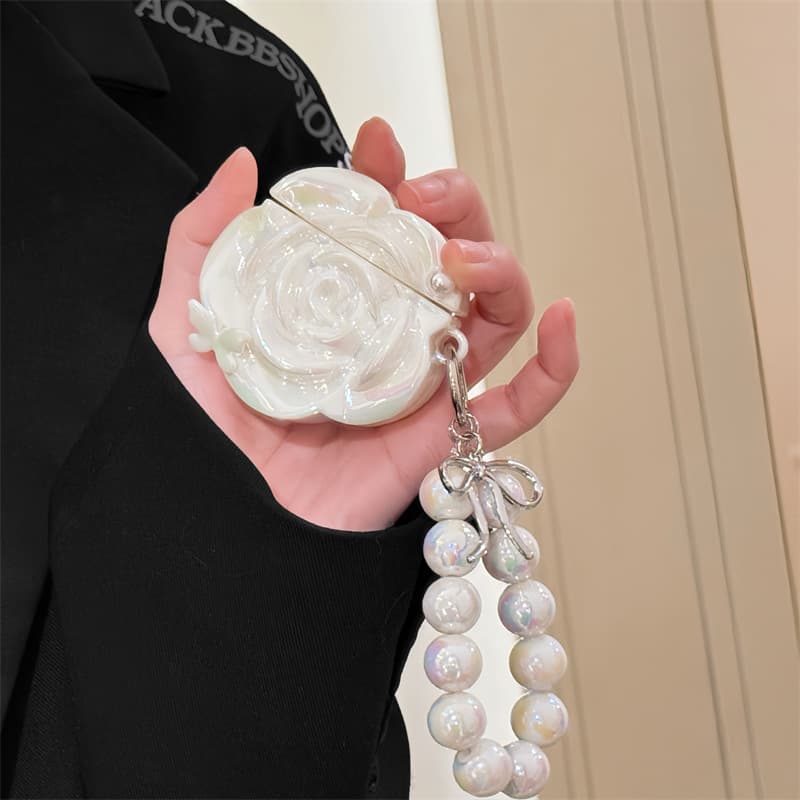 Funda de camelia blanca nacarada con cordón