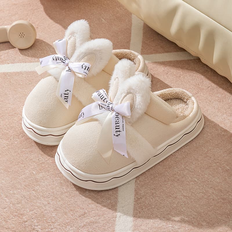 Zapatillas de algodón suave con moño para casa
