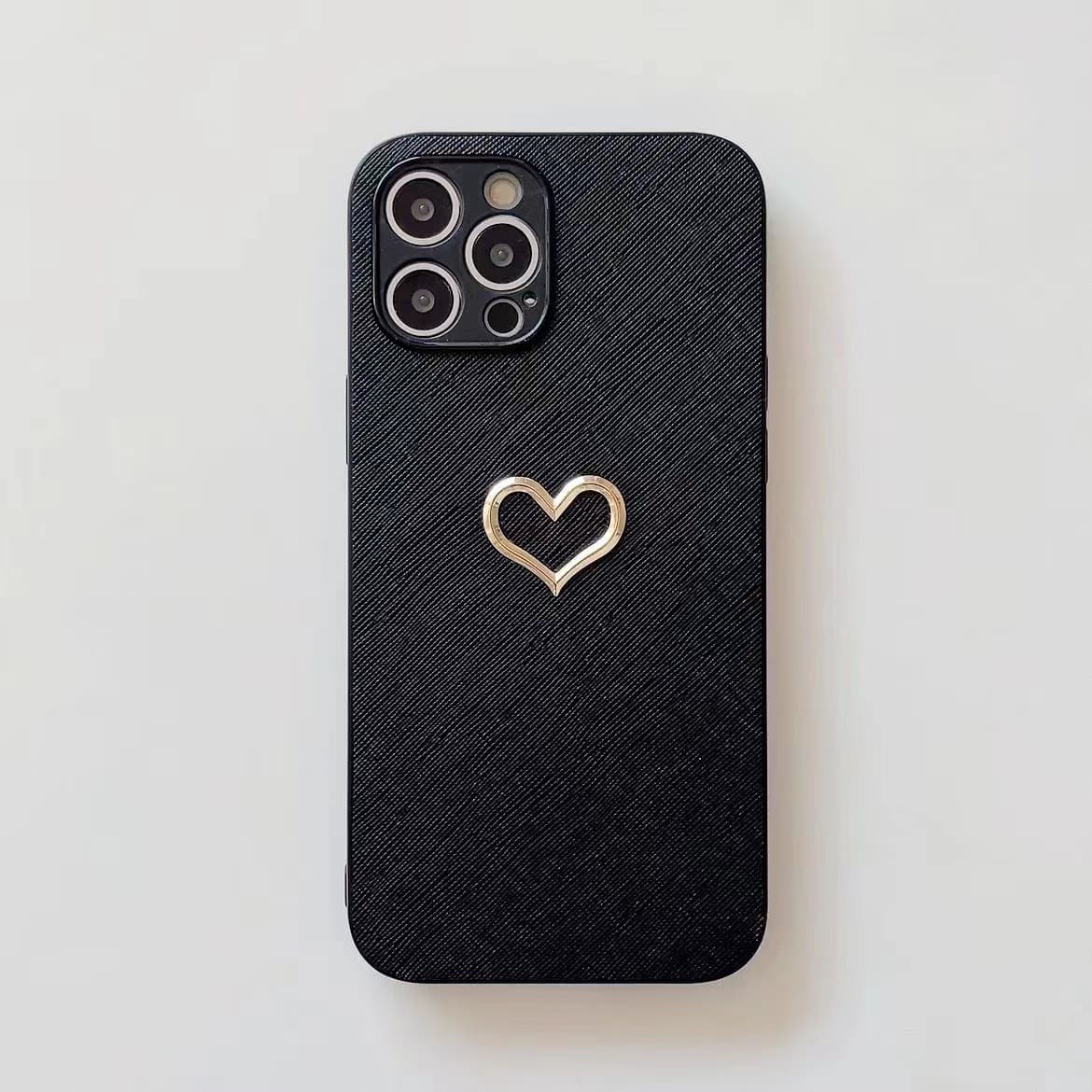 Funda de teléfono con corazón grabado efecto bronce