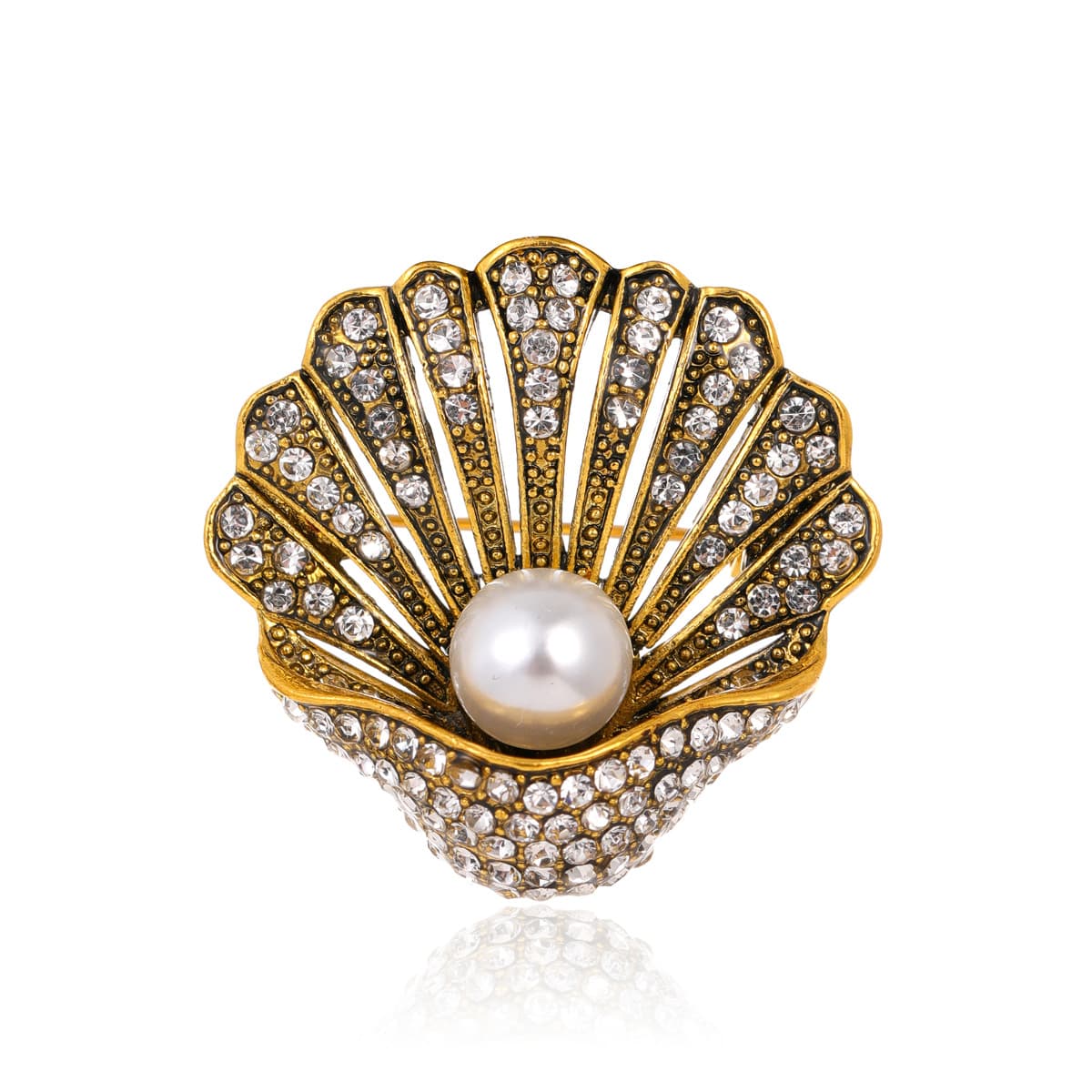 Broche vintage de moda con perla y concha