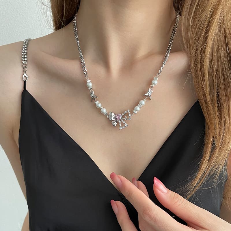 Collar de arco con perla y corazón