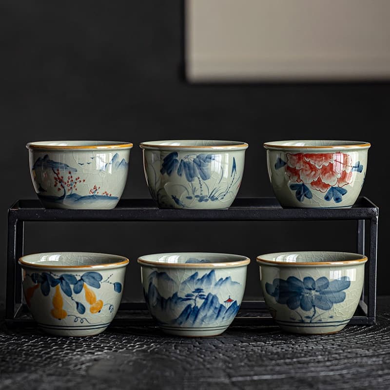 Taza de té de cerámica azul y blanco pintada a mano, estilo antiguo