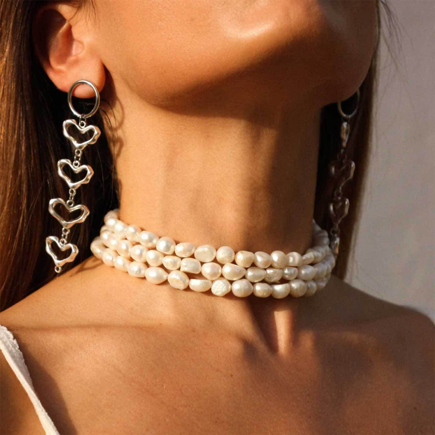 Aretes de corazón hueco en estilo retro y exagerado