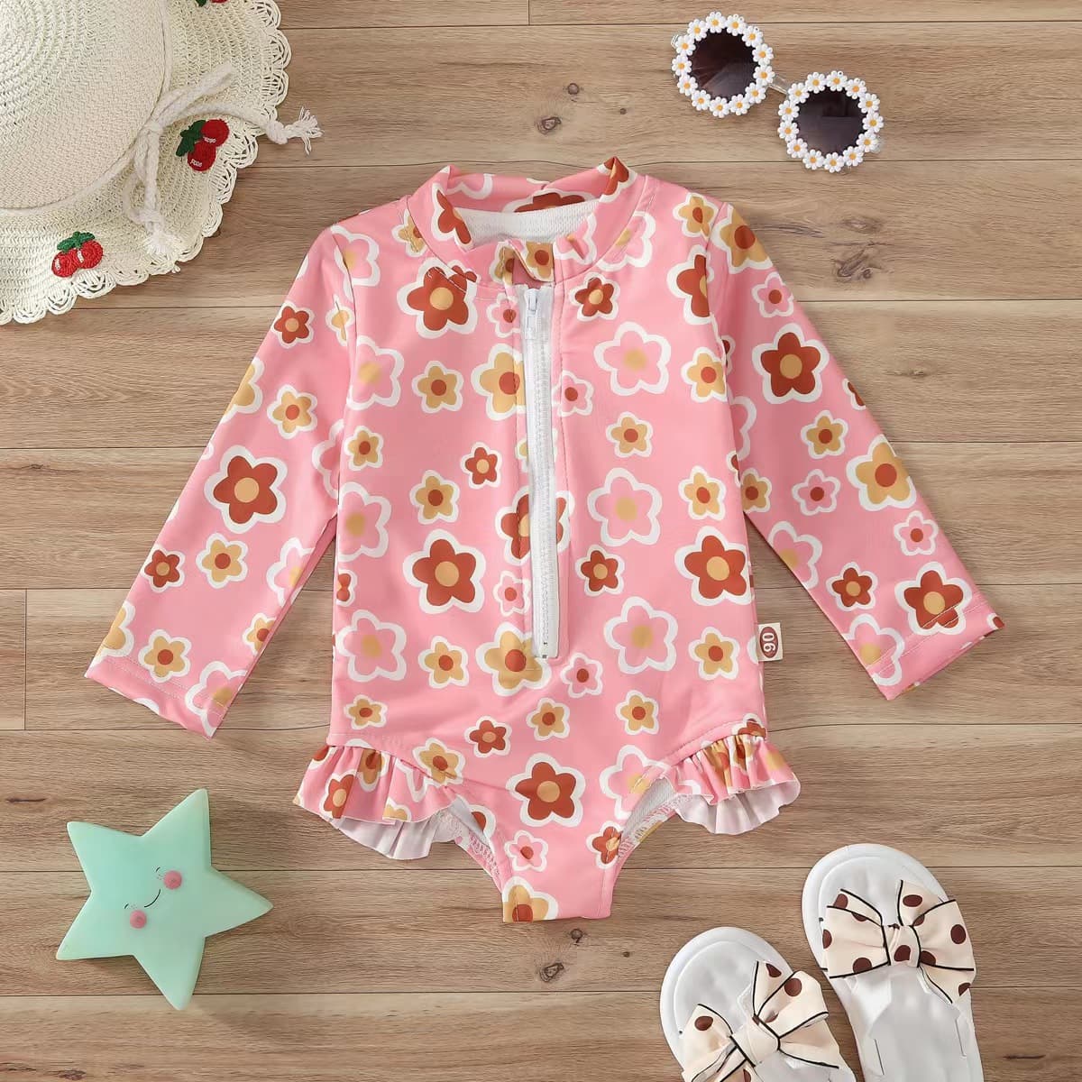 Bikini tipo romper con estampado floral para niña