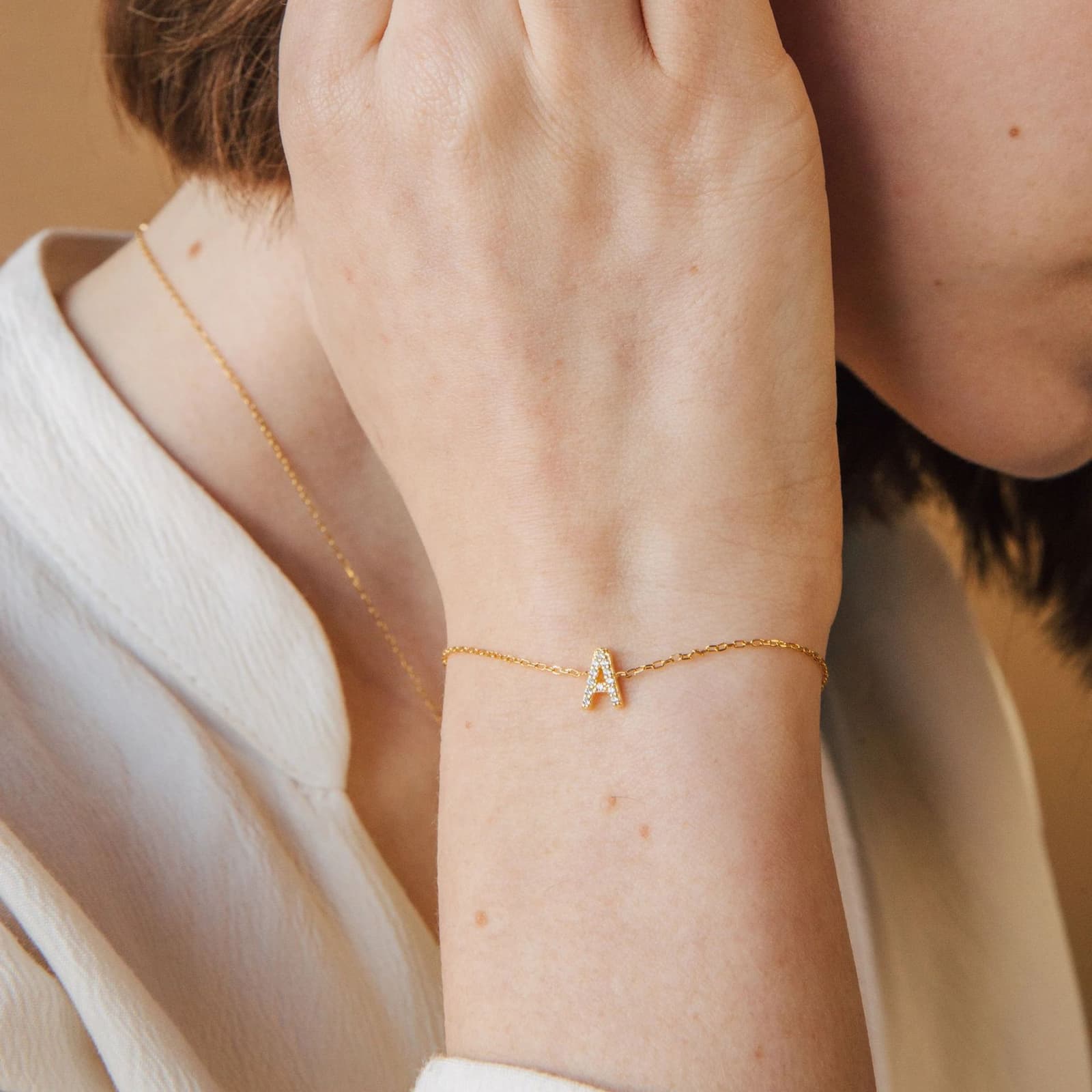 Pulsera de letras en acero inoxidable con diamantes