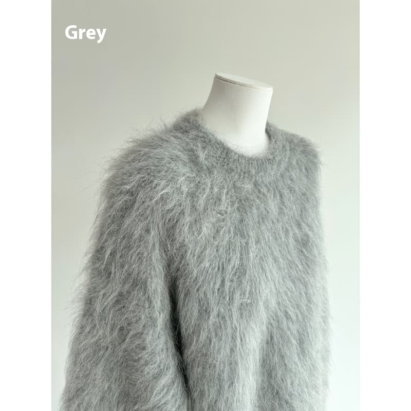 Suéter holgado de alpaca con cuello redondo