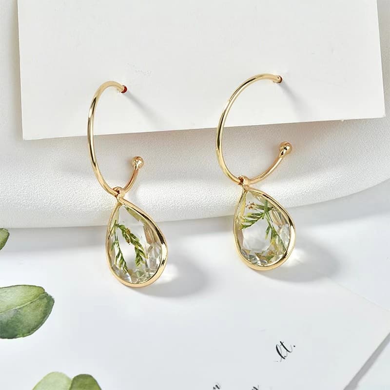 Aretes navideños de gota con hojas naturales