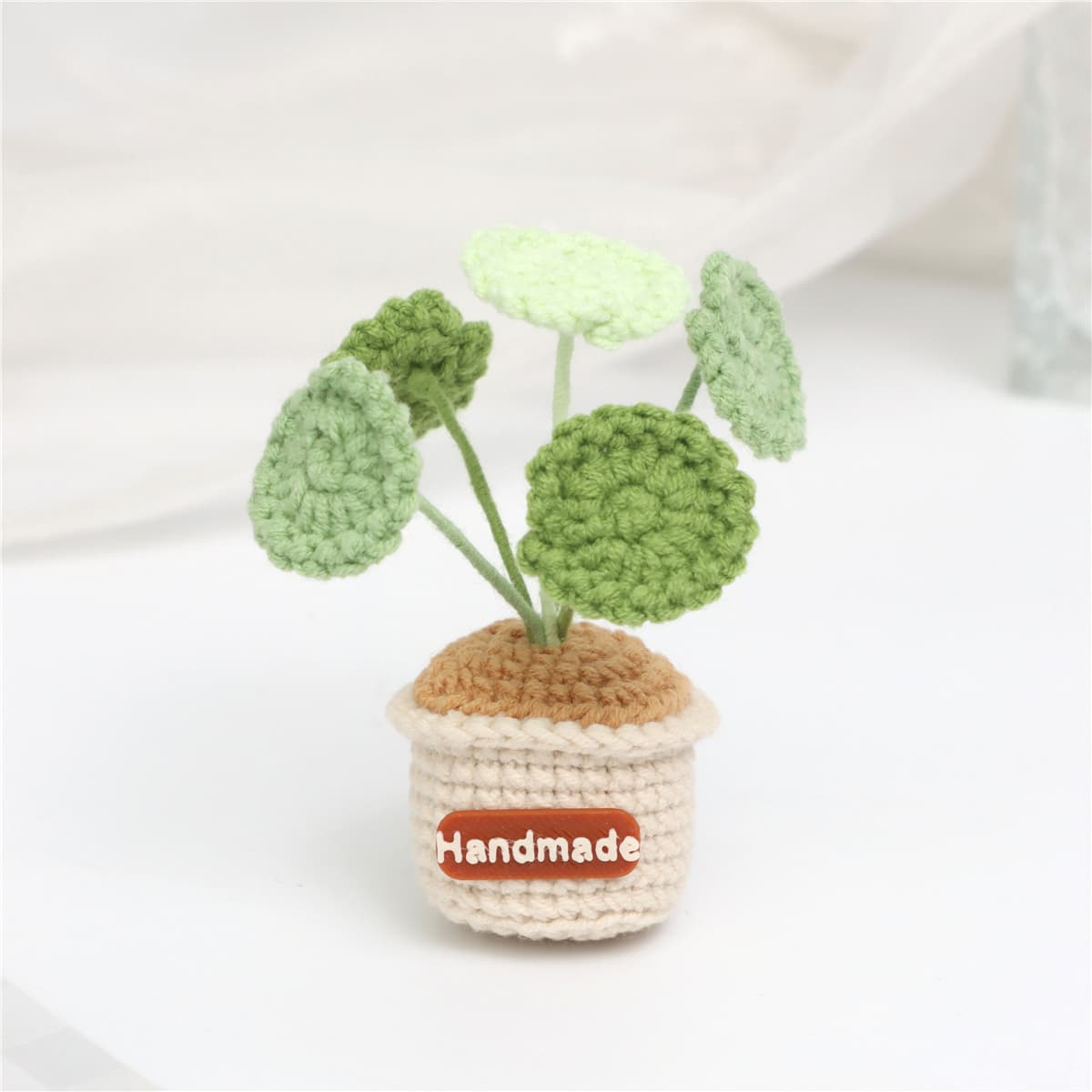 Mini adorno de maceta tejida con imán