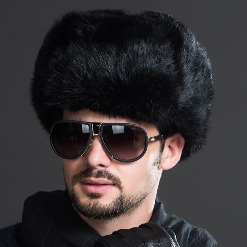 Gorra cálida de piel con protección de oídos