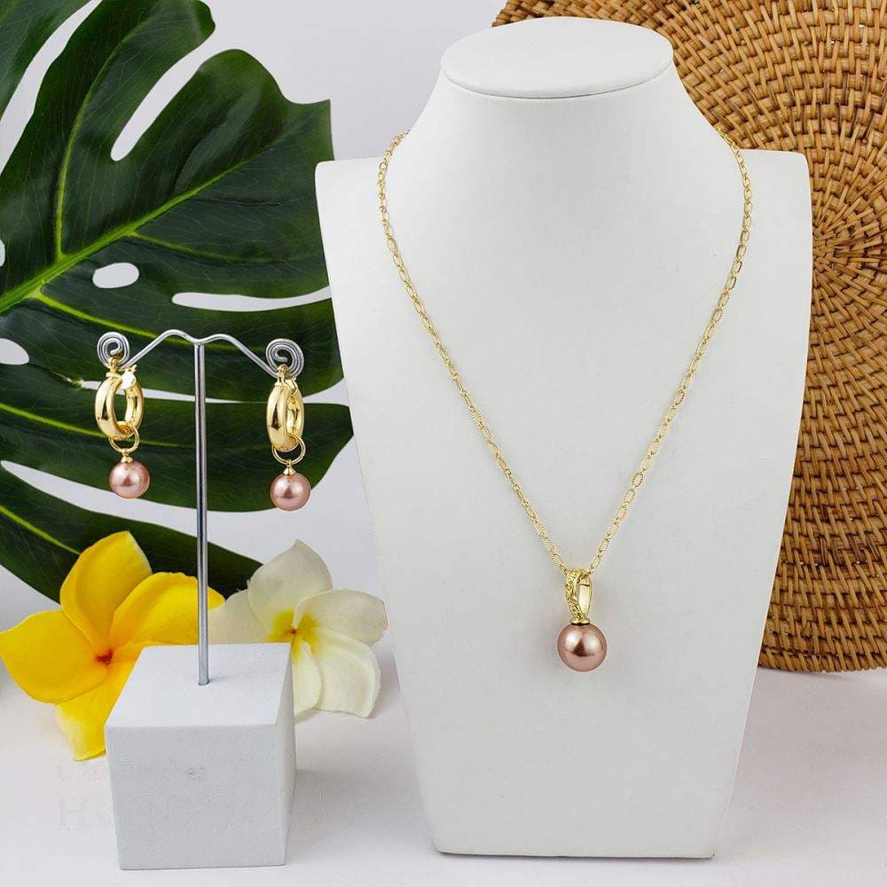 Juego de aretes y collar con perla natural