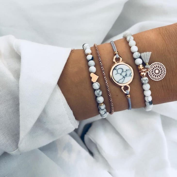 Pulsera piedra redonda turquesa con borlas