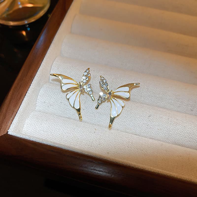 Aretes de mariposa con diamantes de imitación