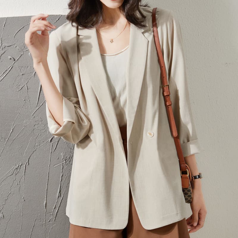 Blusa de traje beige transpirable con protección solar
