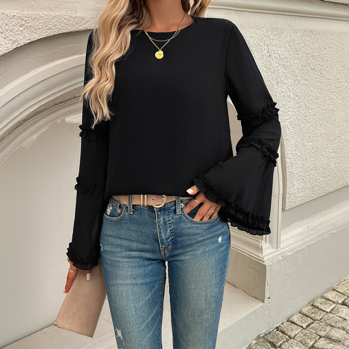 Blusa larga suelta con manga acampanada