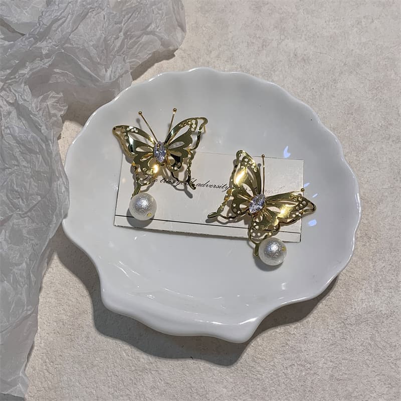 Aretes perla retro de flor