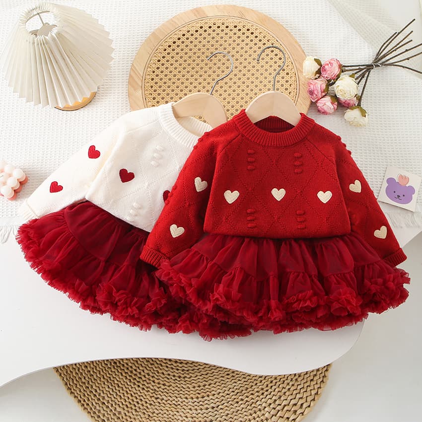 Suéter de punto para niña con corazón bordado