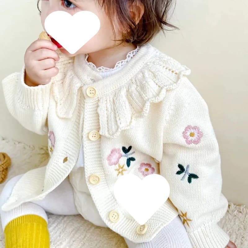 Chaqueta punto niño bordado floral cuello loto