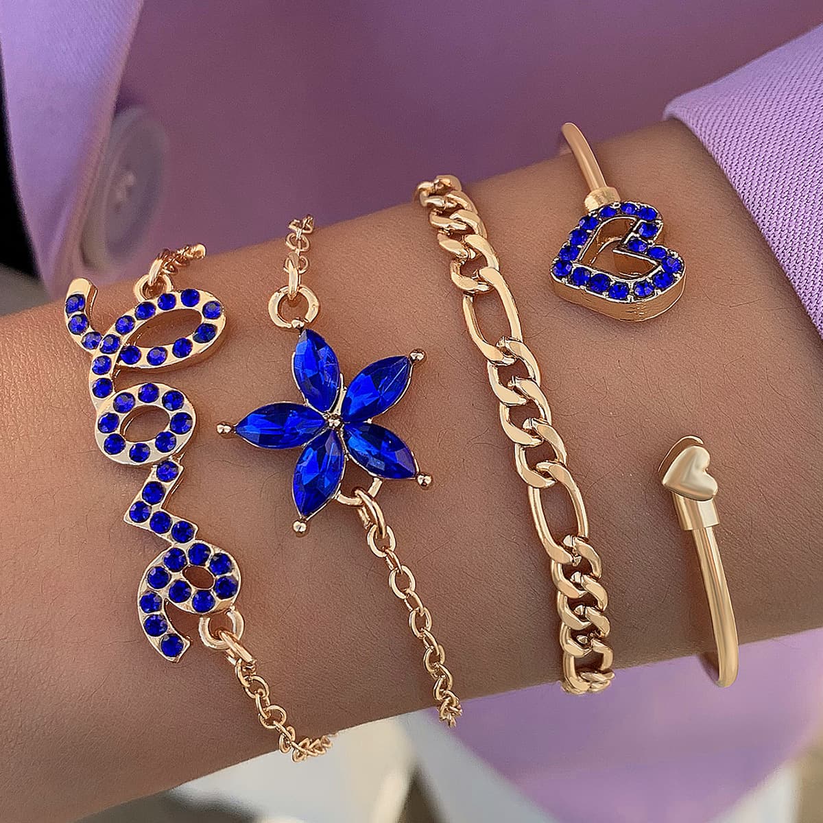 Set de 4 pulseras con flores, mariposas y diamantes