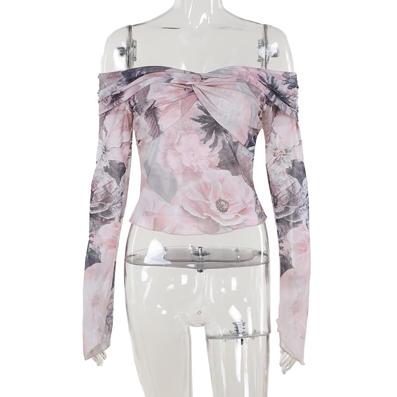 Blusa de malla con estampado floral y manga larga