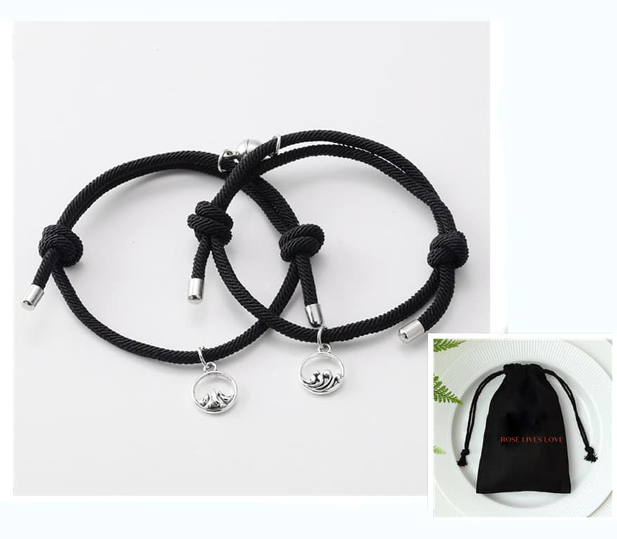 Pulsera magnética de pareja tejida a mano con plata antigua