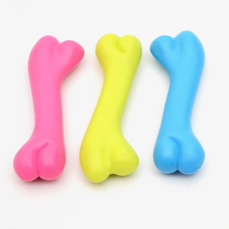 Juguete de goma resistente en forma de hueso para perros