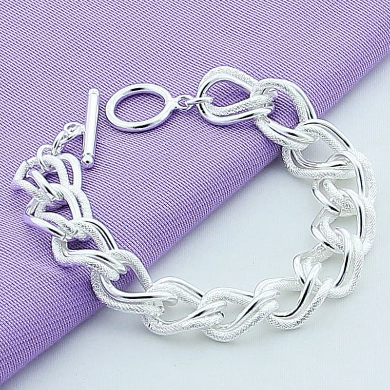 Pulsera de aleación con acabado plateado
