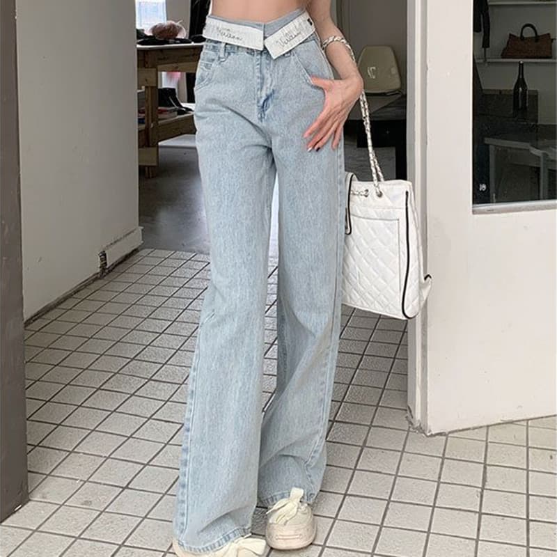 Pantalones denim de talle alto pierna ancha con botones