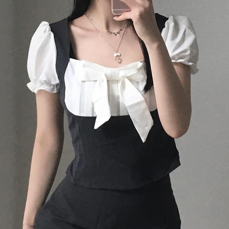 Blusa con manga abullonada y detalle de moño