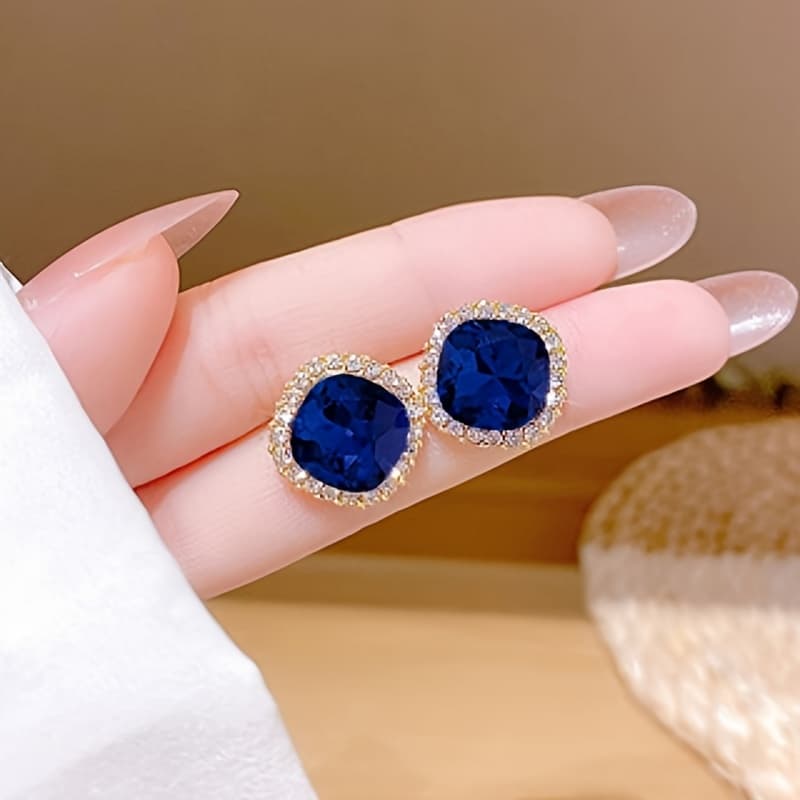 Aretes cuadrados geométricos azul marino con brillos