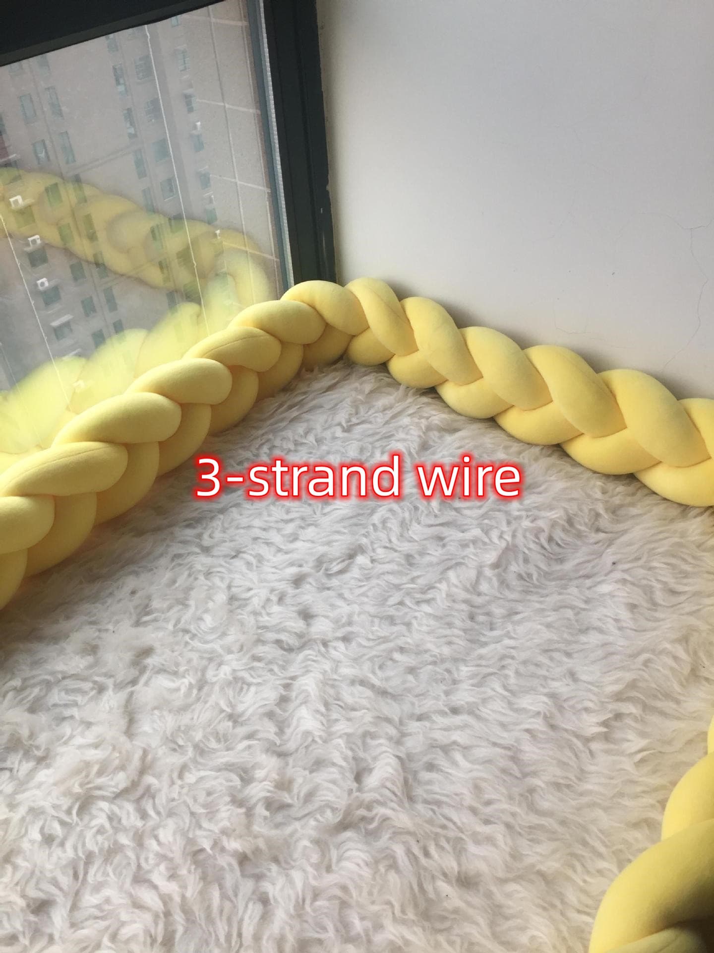 Almohada protectora trenzada para cuna de bebé
