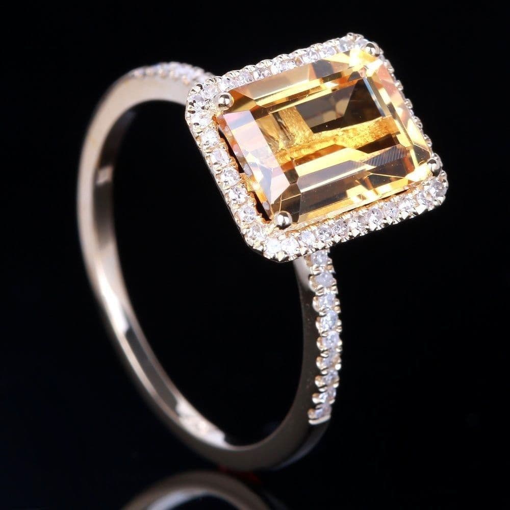 Anillo de lujo con piedra champagne amarilla