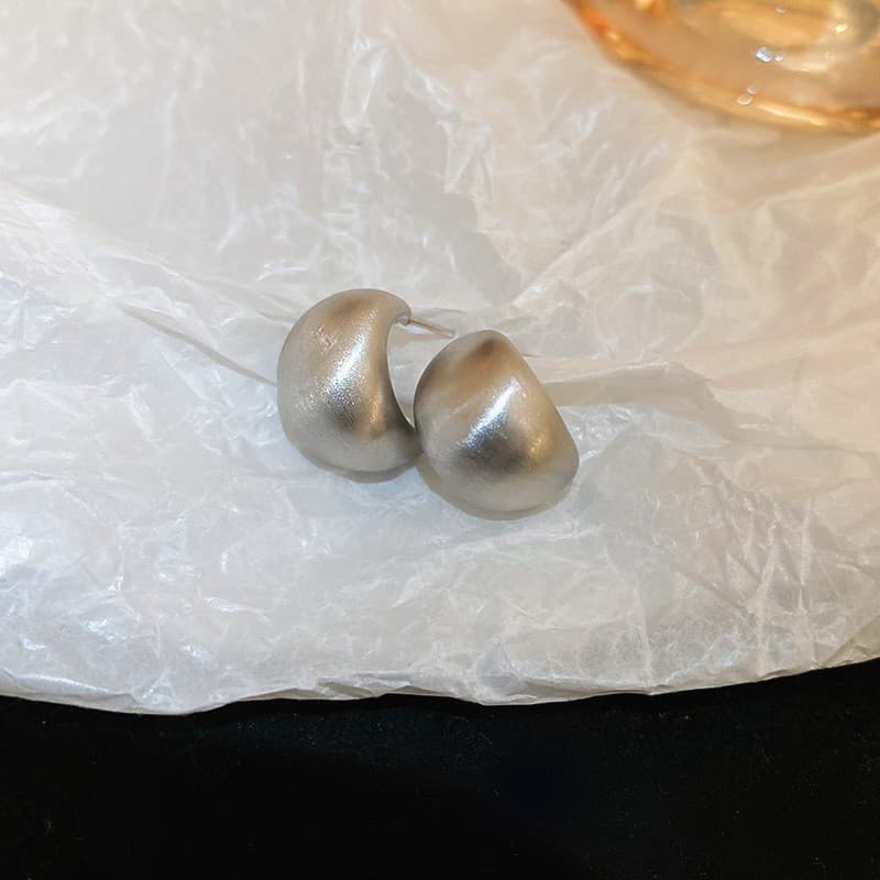 Aretes aro circular de aguja plateada