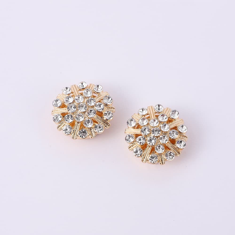 Gemelos de mujer con cristales y perla incrustada