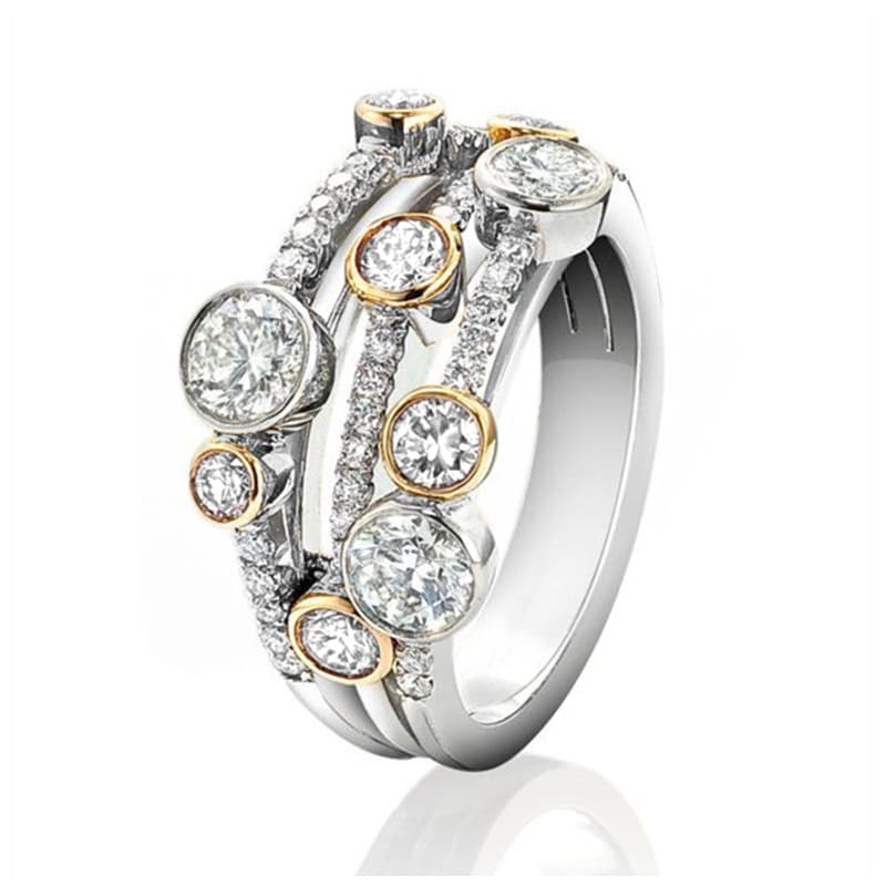 Anillo de dos tonos geométrico con circones brillantes