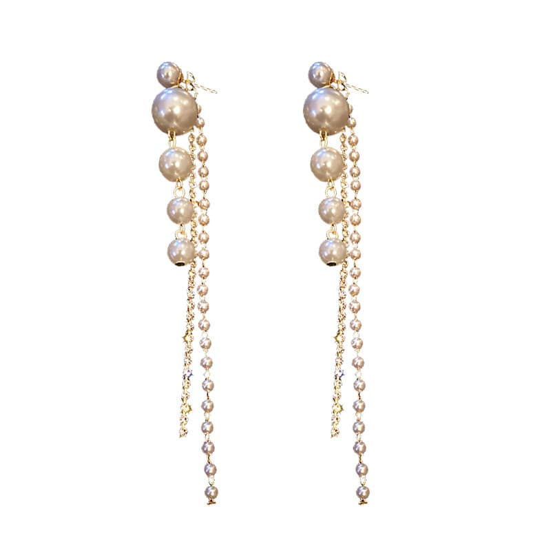 Aretes largos de perla con borla de plata