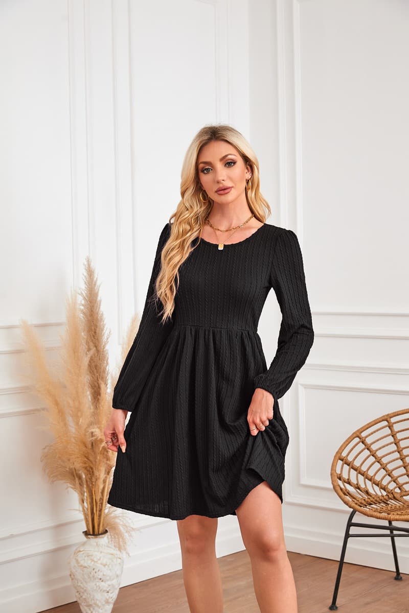 Vestido de punto con cuello redondo y bolsillos