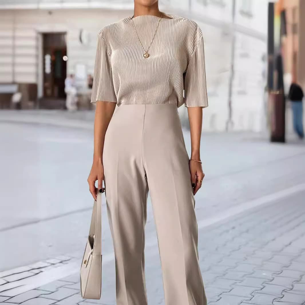 Blusa de punto ajustada con rayas verticales y mangas amplias