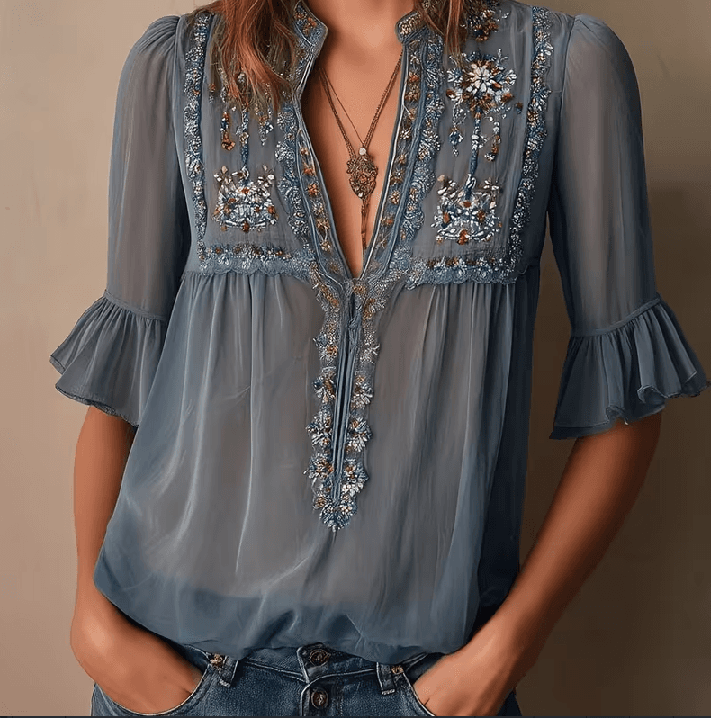Blusa de gasa floral con escote V y mangas acampanadas