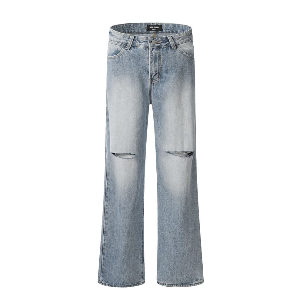 Pantalones vaqueros con rotos en las rodillas