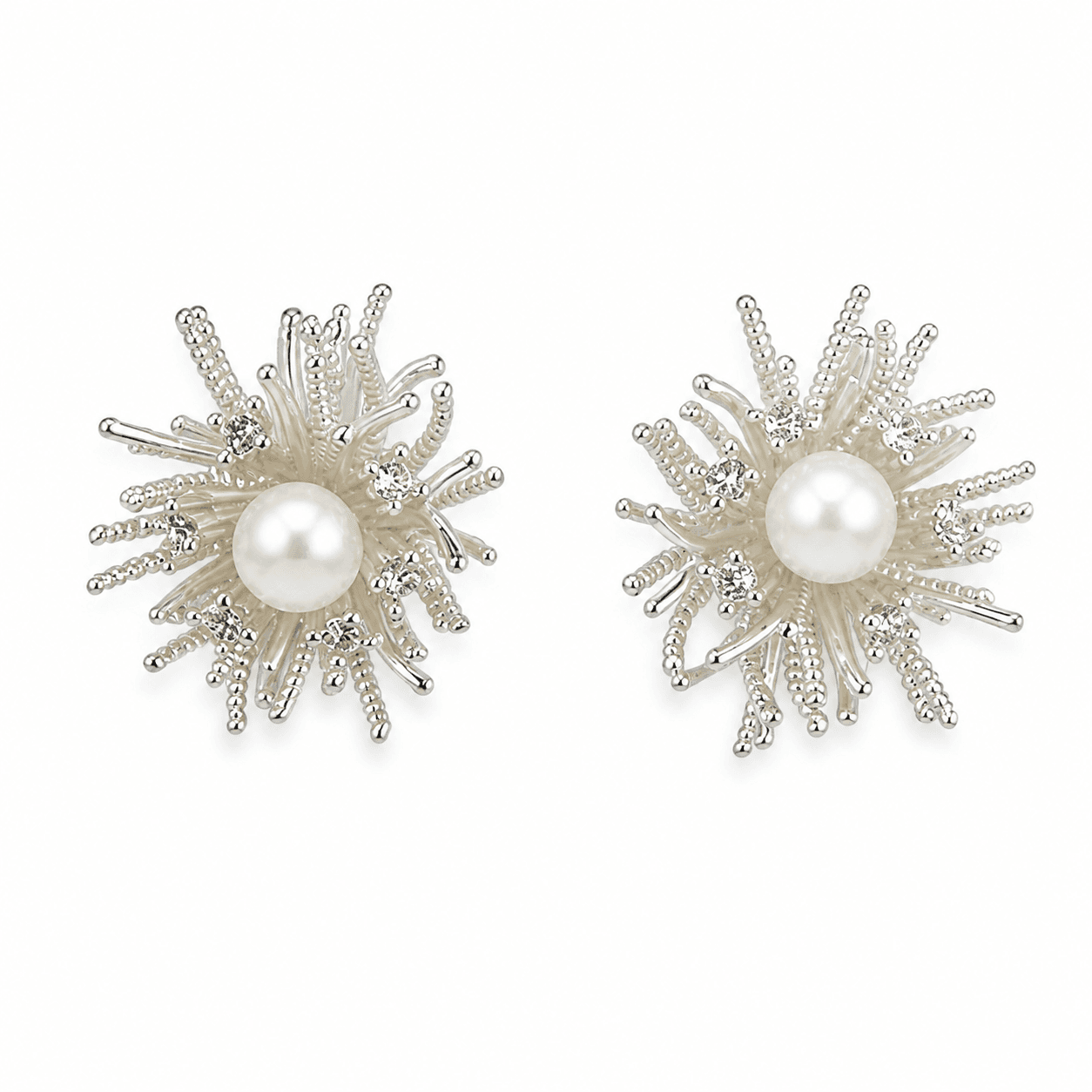 Aretes de perla con diseño radial brillante