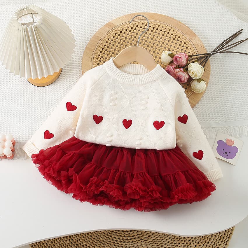 Suéter de punto para niña con corazón bordado