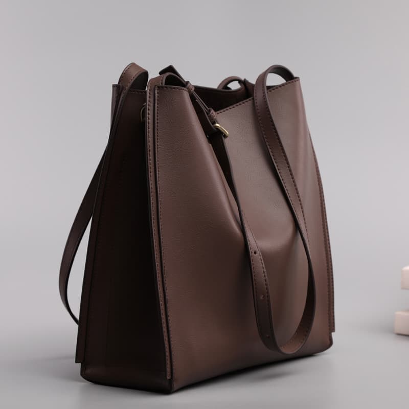 Bolsa de mano de cuero genuino con estilo retro