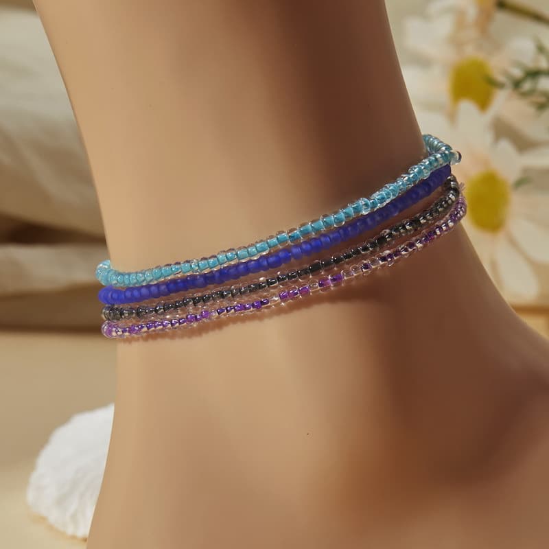 Pulsera y tobillera con perlas luminosas de colores