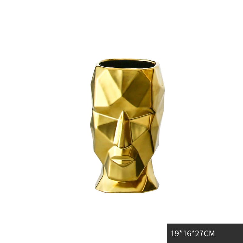Jarrón decorativo con rostro abstracto dorado