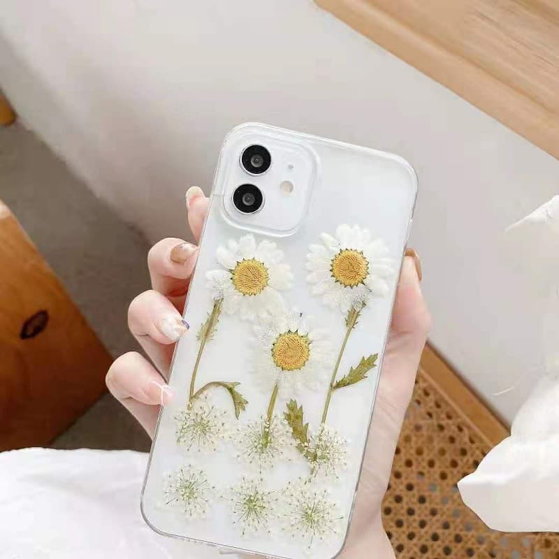 Funda de teléfono con diseño epóxido y margaritas