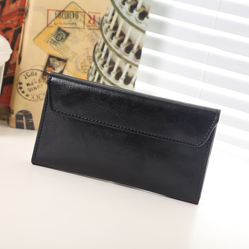 Cartera larga de cuero para mujer