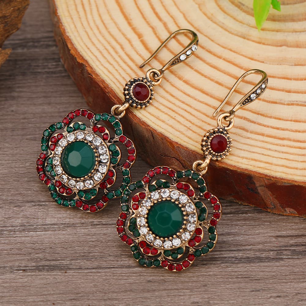 Aretes de girasol con brillantes para mujer